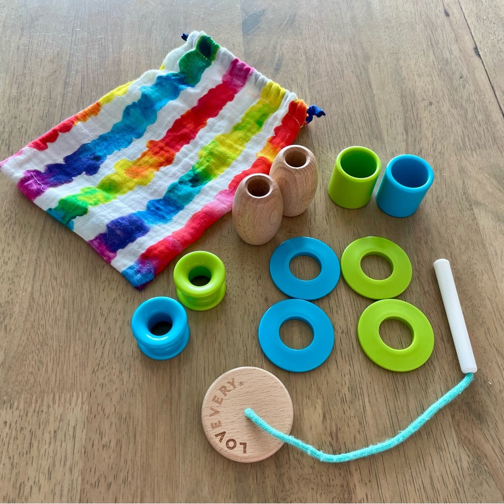 Lovevery Threadable Bead Kit in drawstring bag